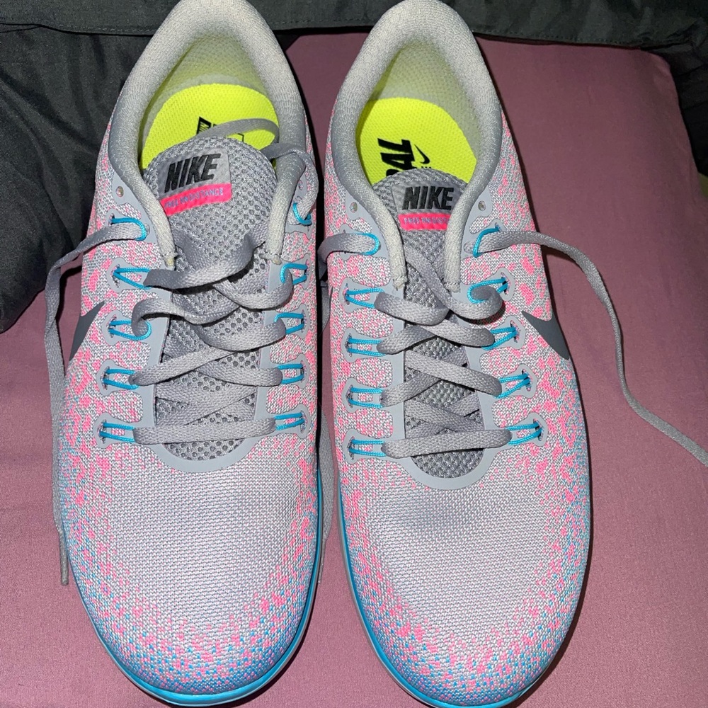 Nike shows grey blue and pink
